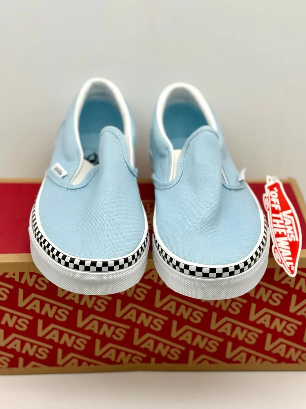 Vans Slip-On Sneakers in Light Blue with Checkerboard Trim